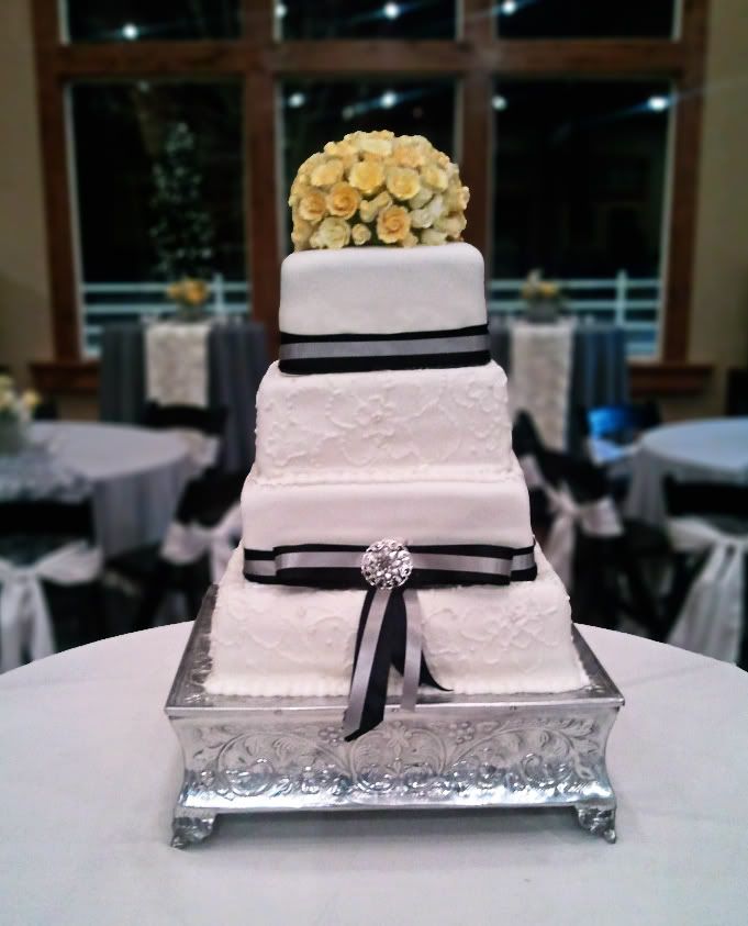 yellow black and grey wedding cake