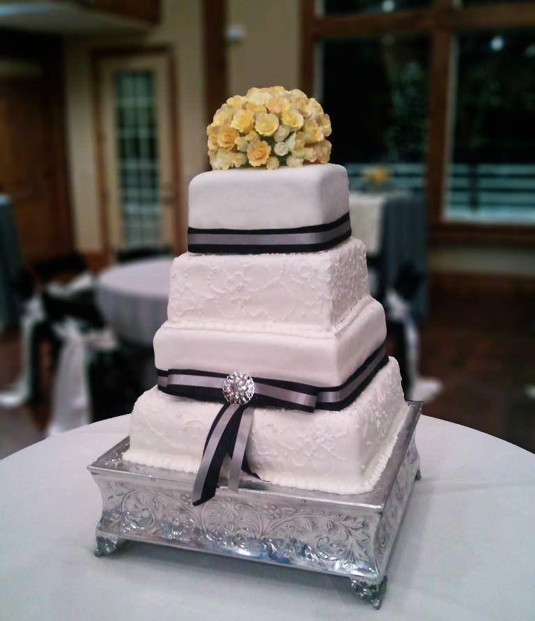 This was a grand wedding cake It stood 6 feet tall on top of the table